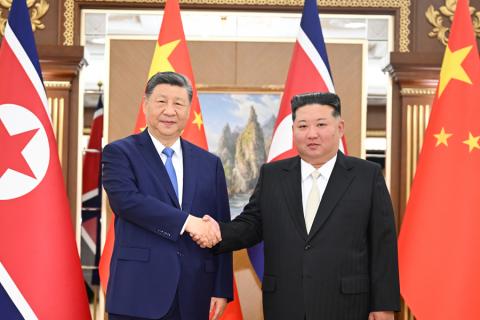 习近平同金正恩举行会谈